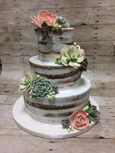 3 tier wedding cake, naked cake with succulent gumpaste flowers.
Click here for larger image.