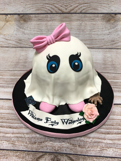 baby shower ghost cake for girl. cute ghost with big pink bow for baby shower.