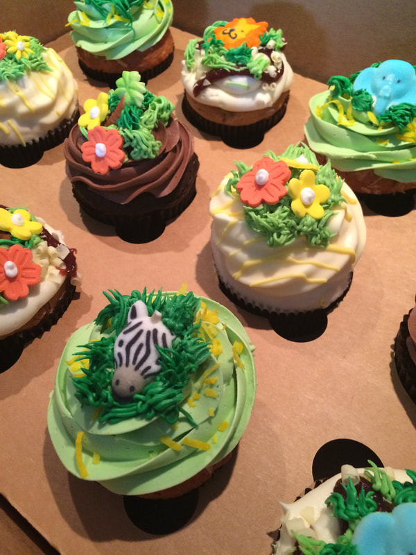 Jungle themed custom cupcakes.